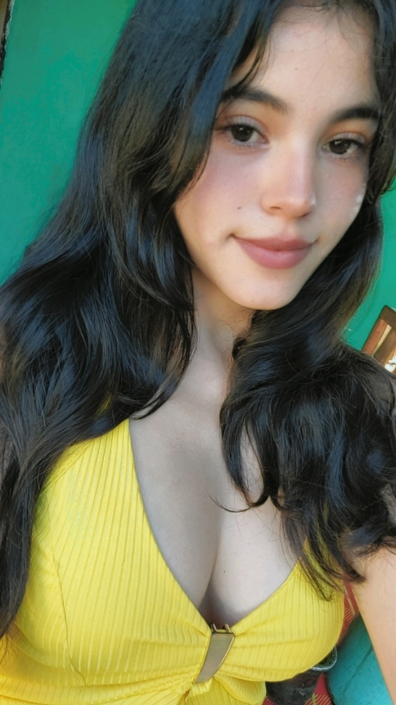 A girl in a yellow top on a private call